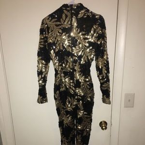Black and gold sequin jumpsuit